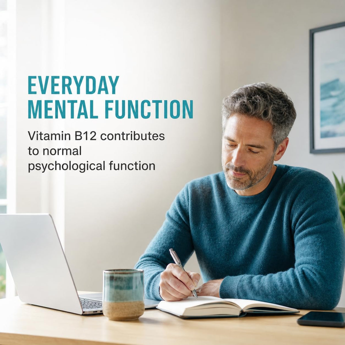 Man writing at a desk beside information about vitamin B12 and normal psychological function